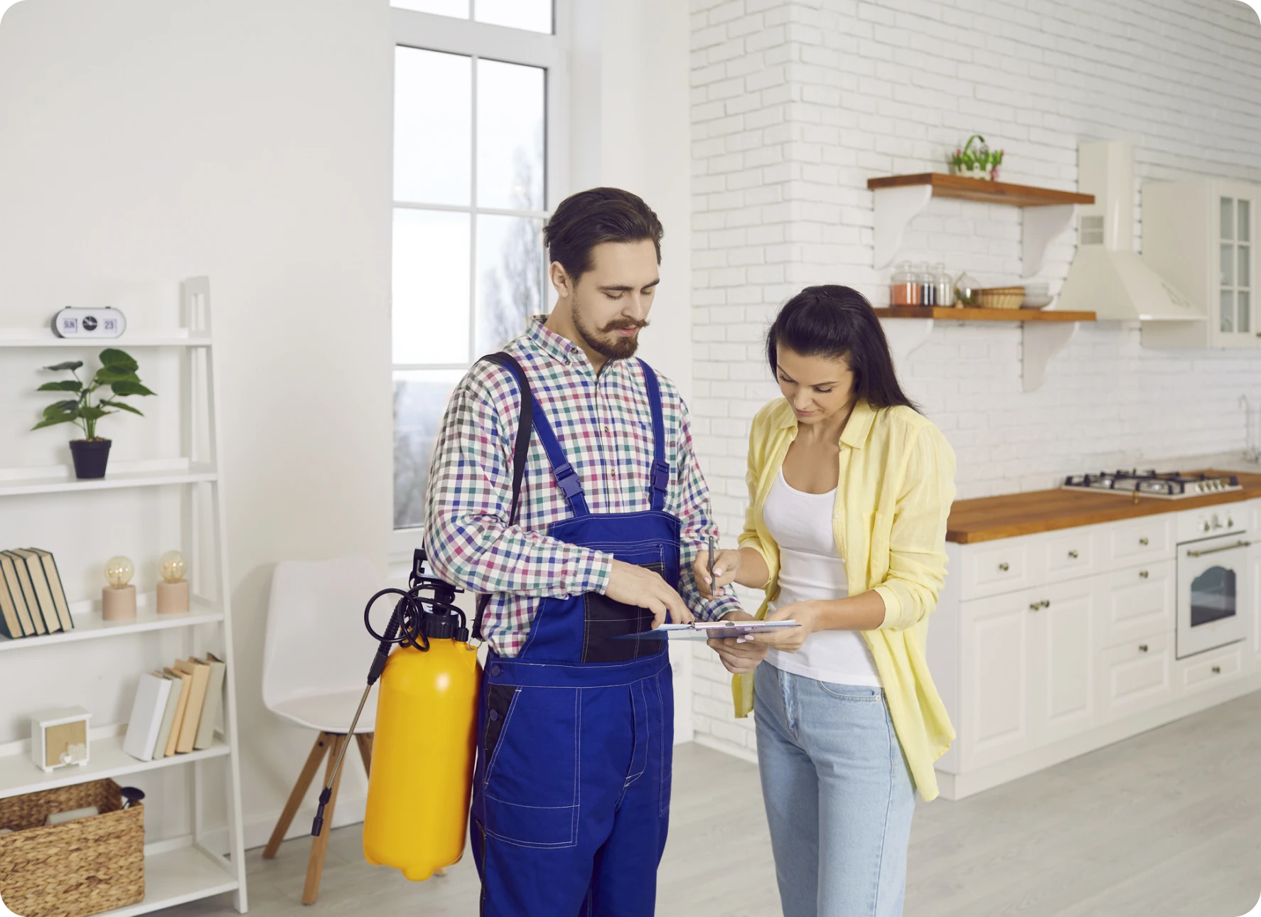 Pest control worker with customer